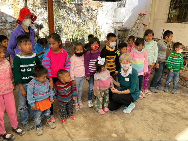 Children wearing Needlepushers clothing.